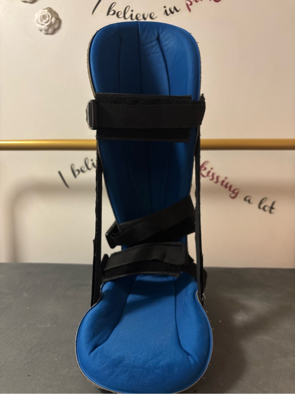 Women's orthopedic Blue Adjustable Ankle/Foot Brace with Black Straps